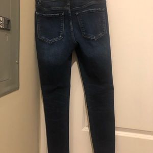 Vervet Mid Rise Ankle Skinny in Dark Blue - distressed